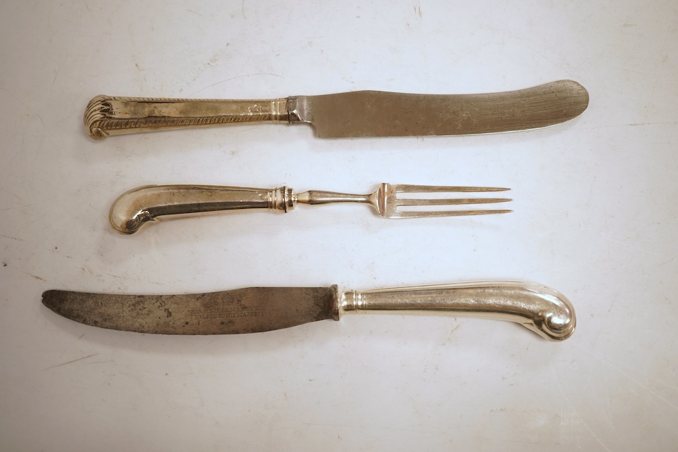 A collection of eleven Georgian silver, white metal or agate handled steel bladed knives, differing sizes, the largest 25cm, together with a set of eleven George III silver pistol handled dessert forks by Moses Brent, Lo